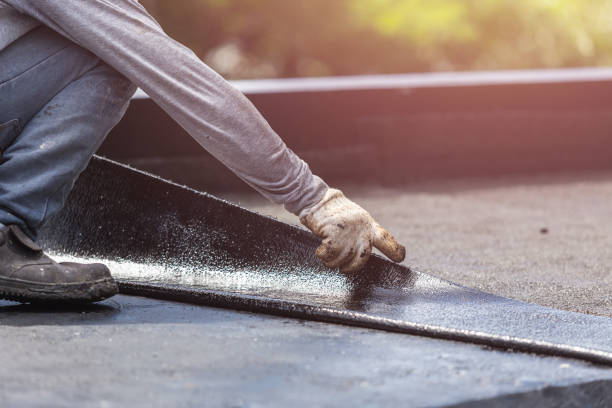 Professional Basement Waterproofing technician working in Durand, WI